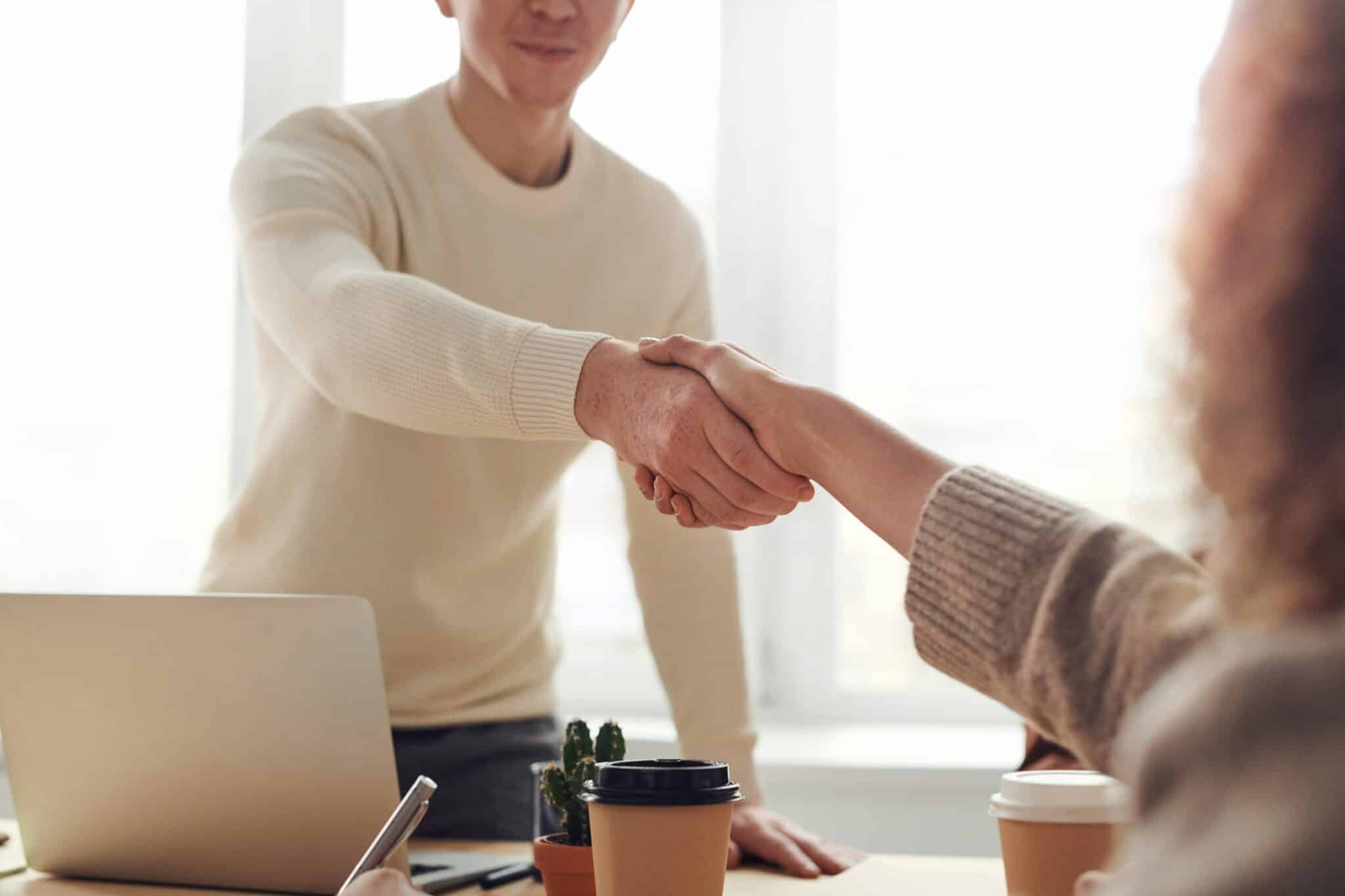 Handshake between employer and employee