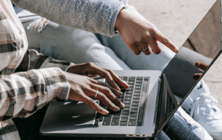 students on laptop