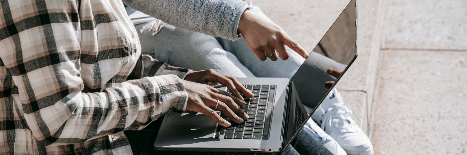 students on laptop