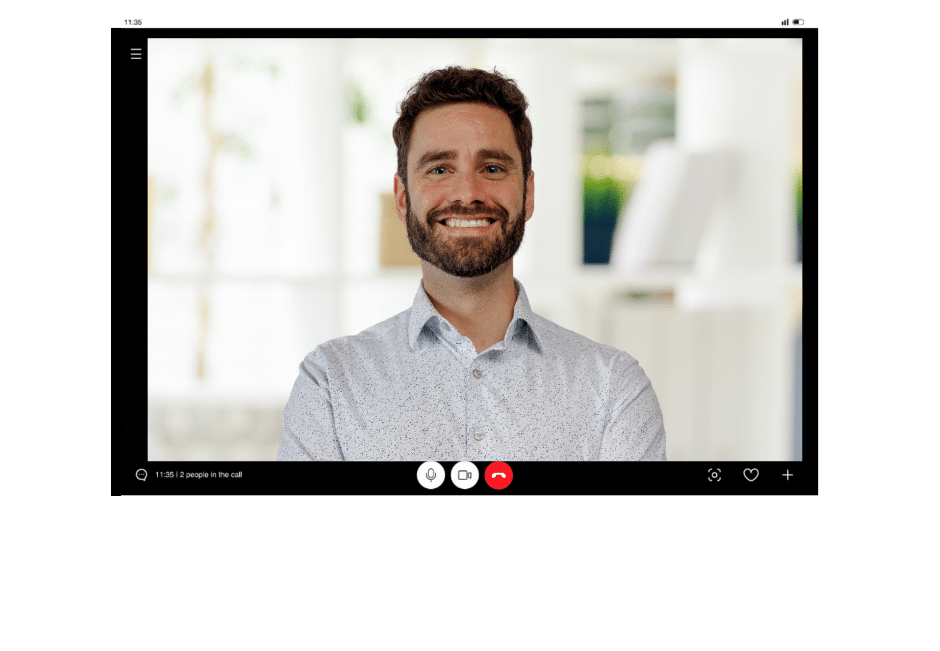 Cutout of a laptop showing a video call with a college admissions coach smiling at the screen