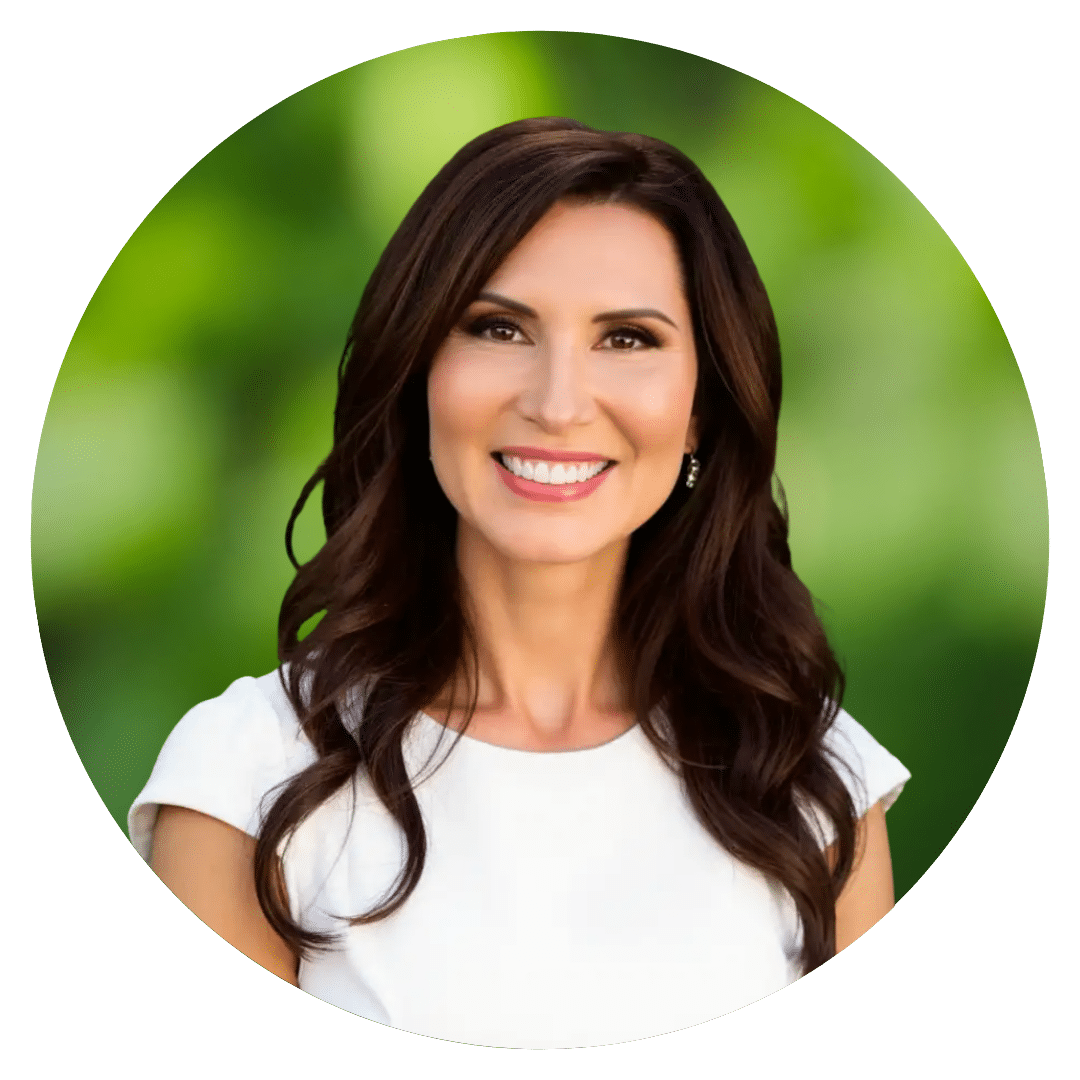 Circle cutout against green leaves of Prepory Coach Maria L's headshot