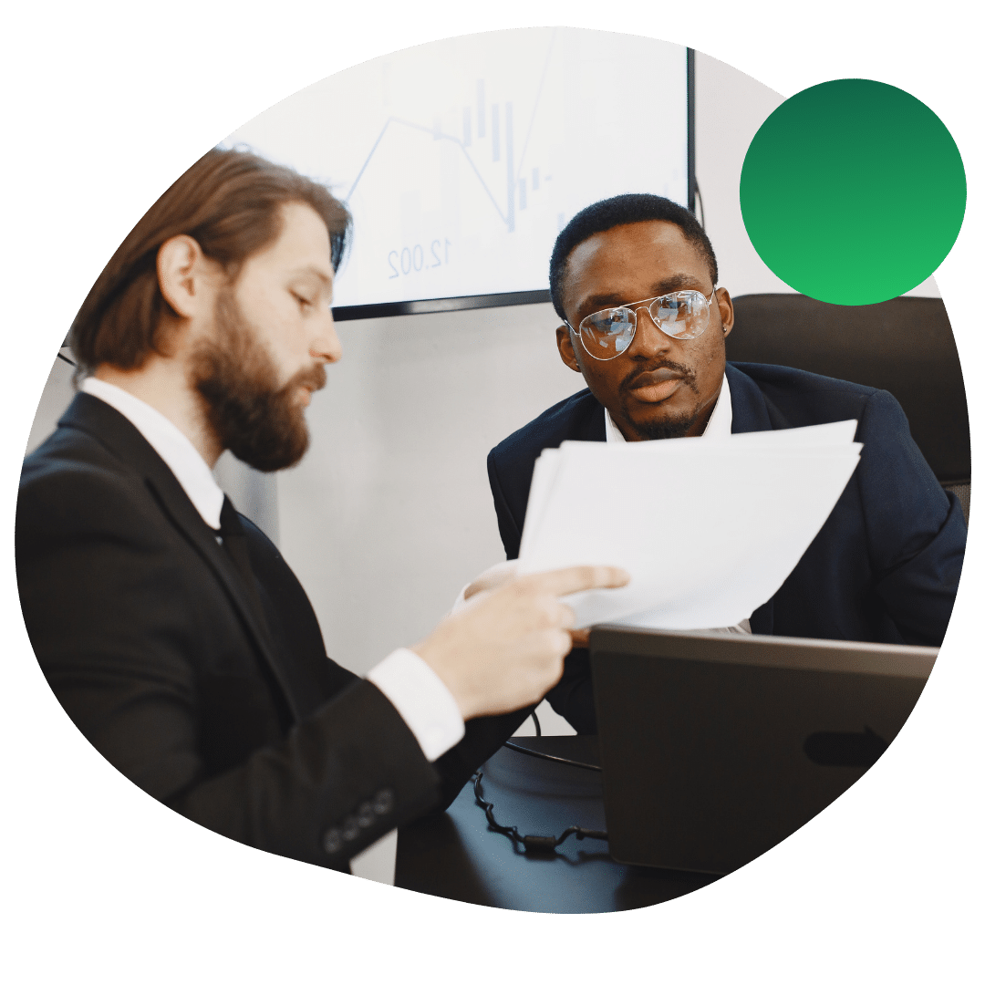 Two men in business suits collaborating on a public policy issue