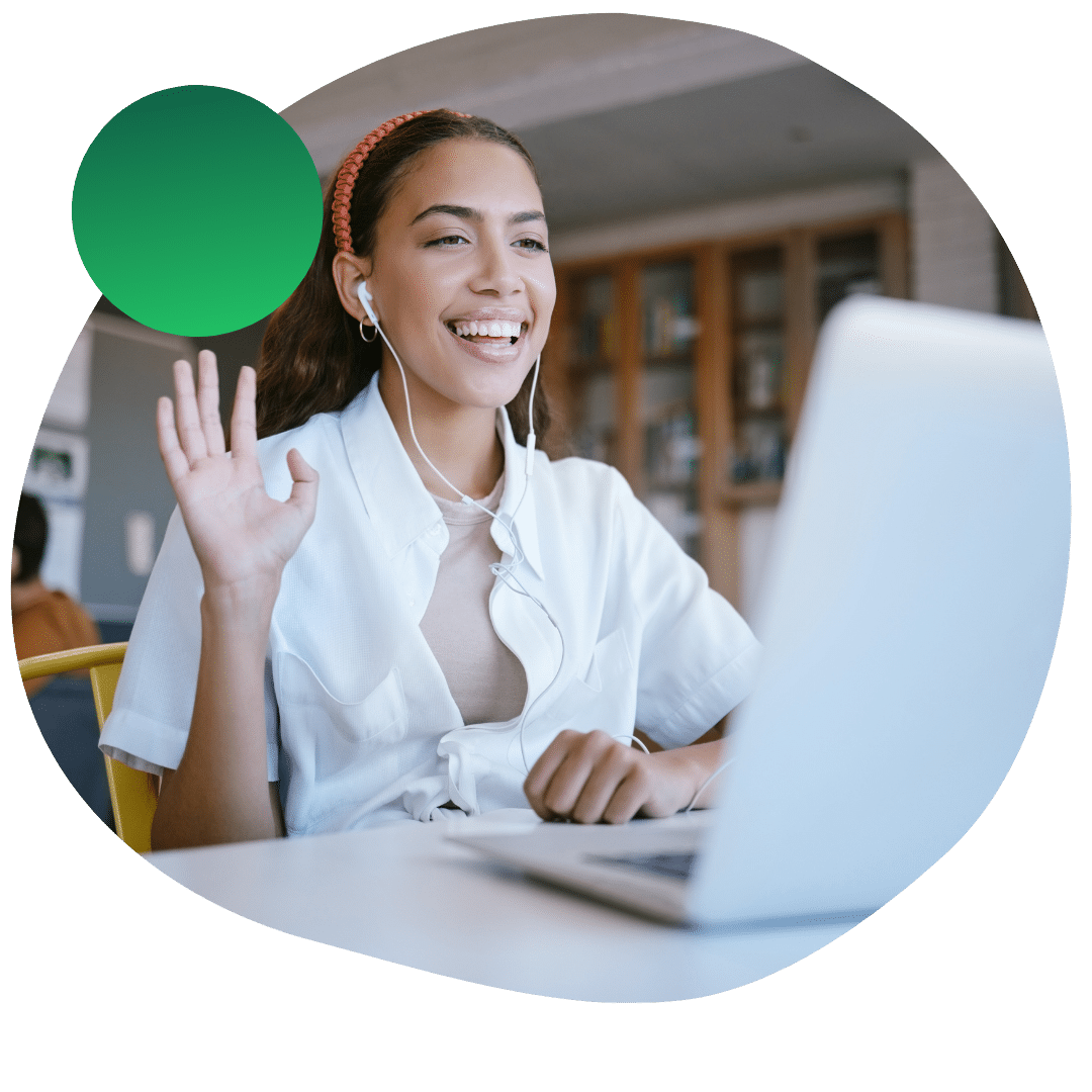 Student smiling and waving to her Prepory UC Transfer admissions coach on zoom