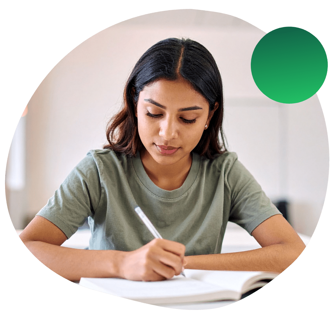 Woman drafting an essay for her graduate college application