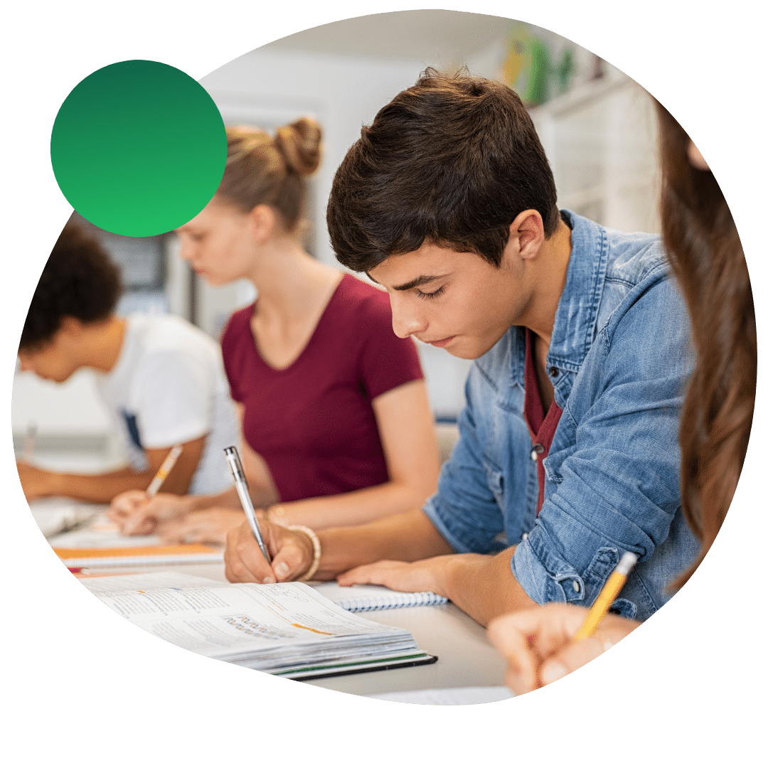 Students working on an essay for their college applications