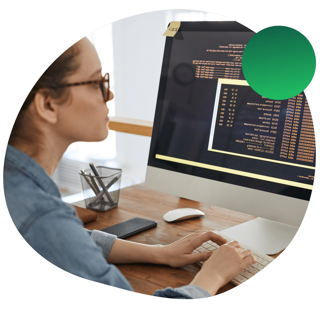 Woman working on her application to computer science PhD programs
