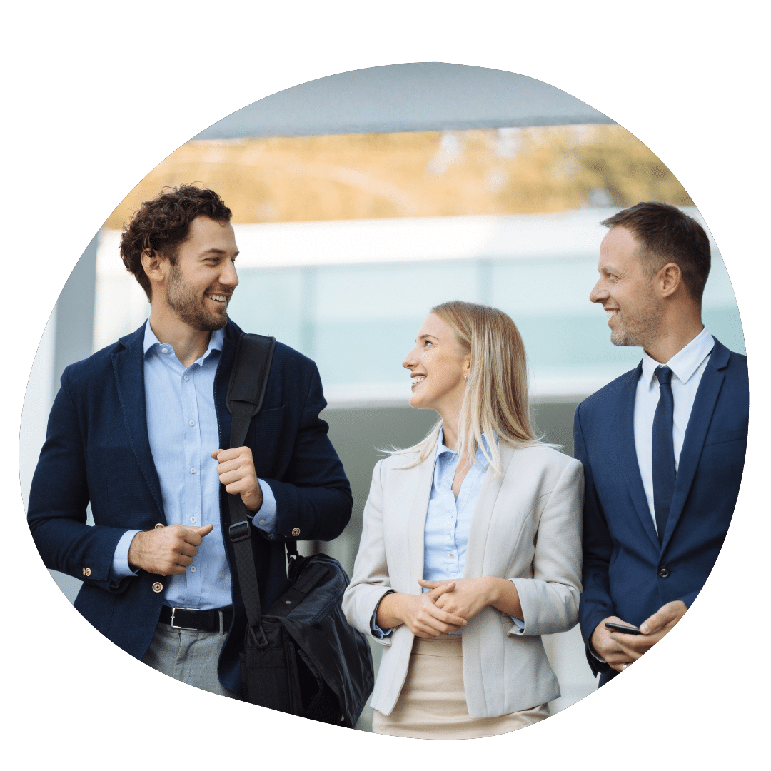 Working businessmen and women talking after their MBA class