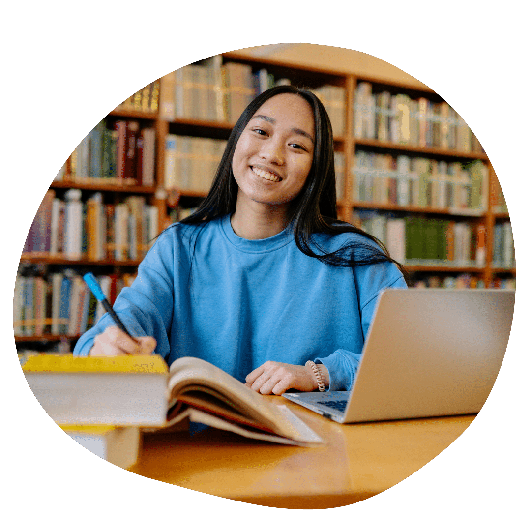 College sophomore studying in the library