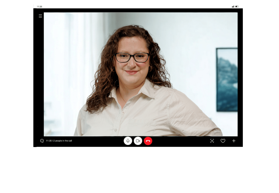 Cutout of a lap showing a video call with a mba admissions consultant gesturing at the screen