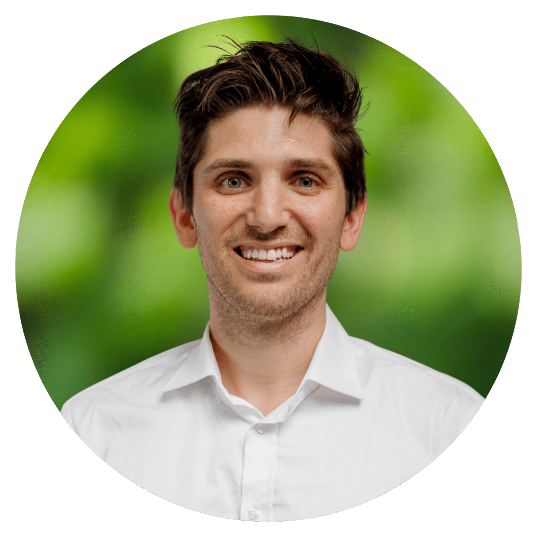 Circle cutout of Sam L.'s professional headshot, with a background of leaves