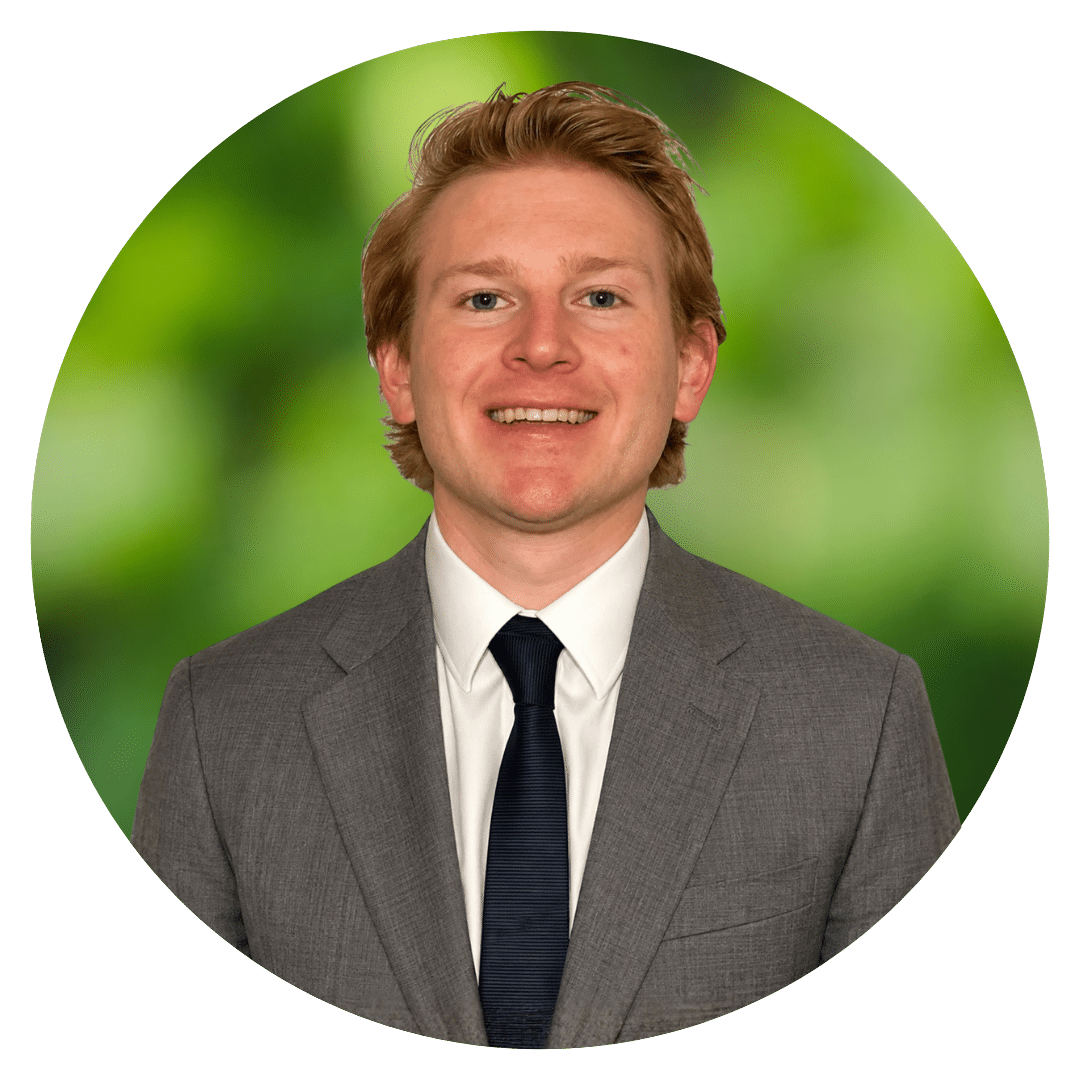 Circle cutout headshot of Prepory Coach Andrew S. behind a blurred background of green leaves